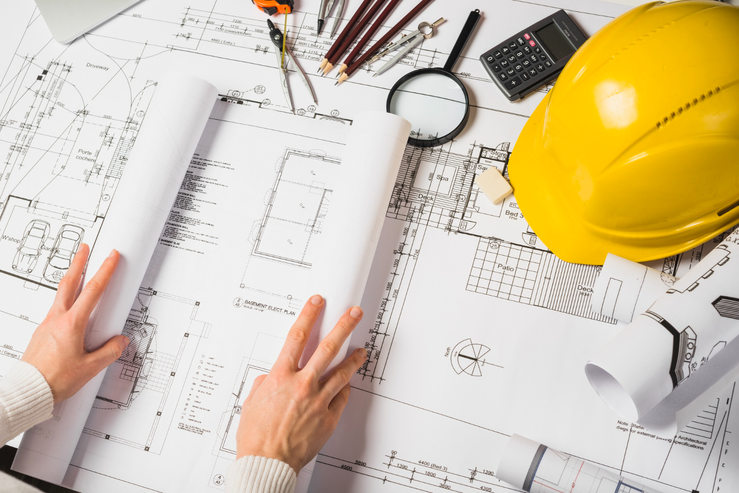 crop-architect-opening-blueprint Property Investment